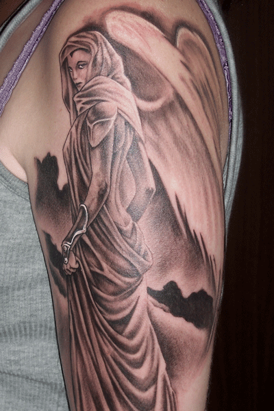 2nd place winner of Large Black & Grey, 2006 Meeting Of the Marked. Female angel with just the right amount of sass.